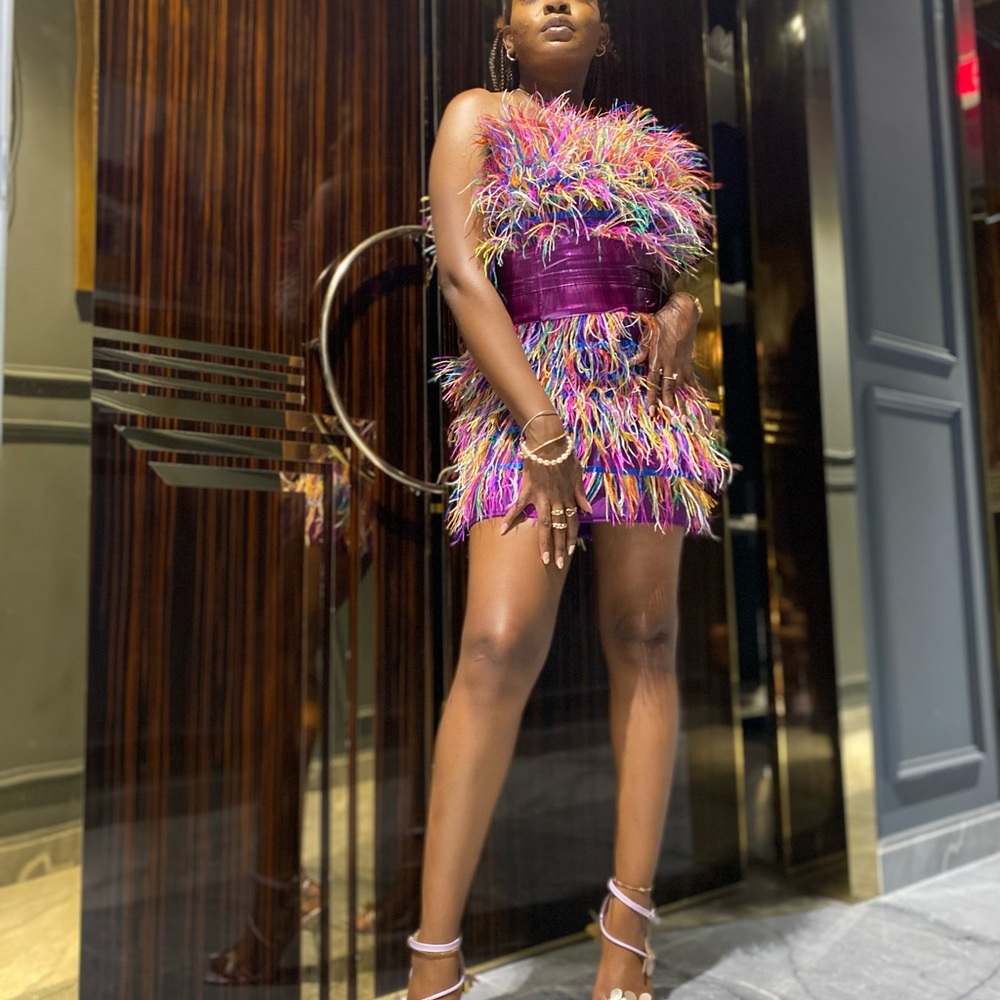 Multicolor feather dress with purple latex corset